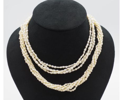 Two vintage rice pearl necklaces one with silver clasp