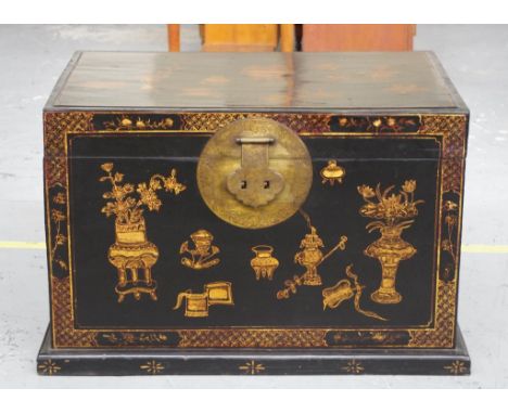 Chinese black lacquered trunk with glass top for use as a table, 92.5cm wide, 65cm deep, 58cm high