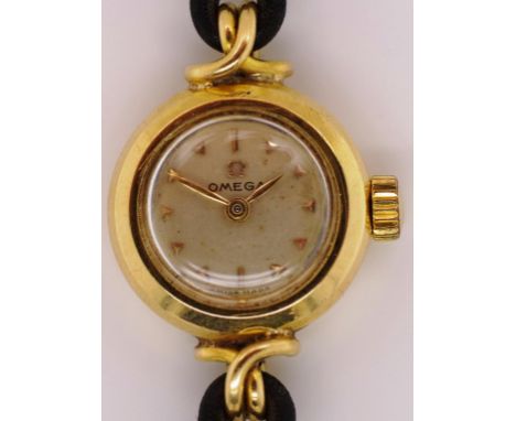 Vintage Omega ladies cocktail watch in a 18ct gold watch case, with mineral glass. Manual wind movement was working when test
