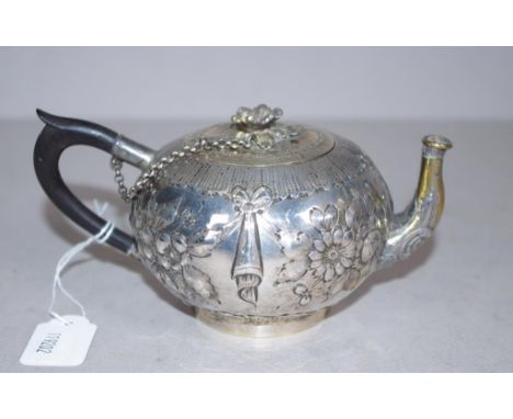 Antique hallmarked Dutch silver teapot hallmarked to base, embossed floral and garland decoration, floral finial to lid. Hand