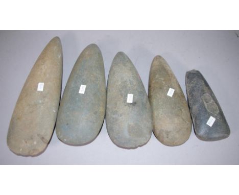 Five various Papua New Guinea stone axe heads collected from the Mount Hagen area during the 1970s 1980s. Length 32cm approx 