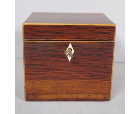 George III casuarina cube caddy strung in boxwood and with diamond shaped escutcheon, with key. c1800, 13cm x 10cm, 12cm high