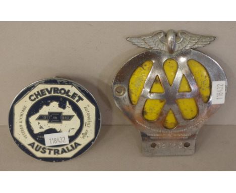Two various vintage bumper car badges including English Automobile Association, chrome on yellow background, Registration No.