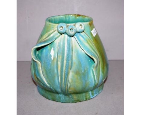 Vintage Australian studio pottery vase applied gumnut and leaf decoration, on green ground. Marked 'HS' to body. Height 14cm 