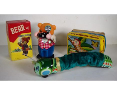 Two boxed vintage wind up tin toys comprising Green Caterpillar (Daiya - Japan) & Bear w/ Flashcamera