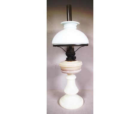 Antique oil lamp with glass chimney & milk glass shade, 55cm high approx.