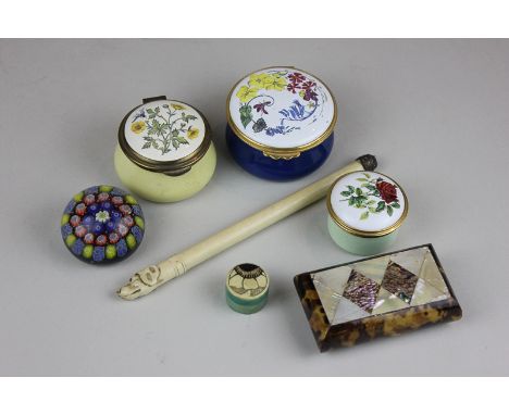 Three enamel boxes, a Scottish millefiori glass paperweight, a blond tortoiseshell and mother of pearl trinket box, a bone ta