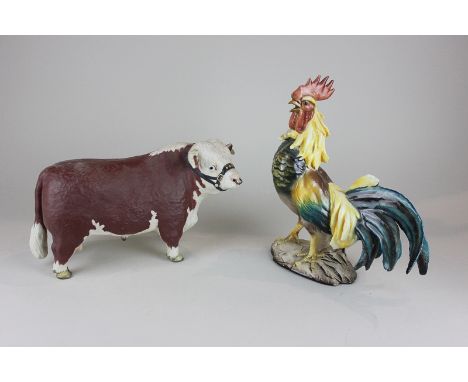 A porcelain model of a Hereford bull signed VFA to base, together with a model of a cockerel, 26cm high