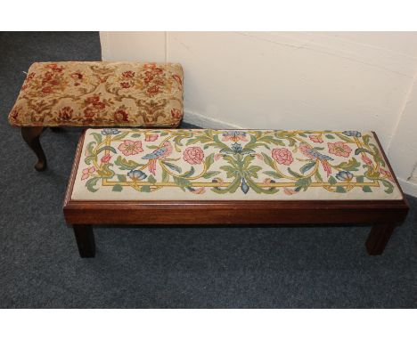 A 20th century mahogany framed tapestry foot stool, 90cm, and an adjustable foot stool