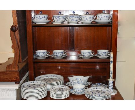 A Royal Copenhagen part dinner and tea service including seven dinner, nine dessert and eight bread plates, five teacups and 