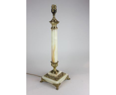 An onyx and brass column table lamp on square base and scroll feet, 50cm high