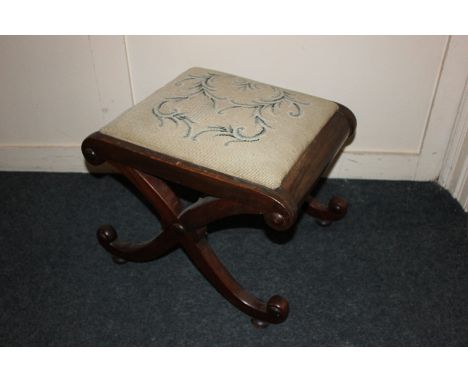 A 19th century mahogany x-framed tapestry stool