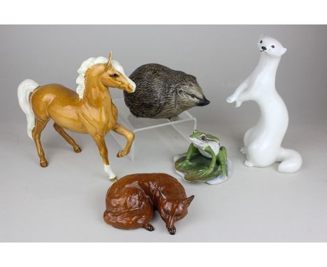 A Beswick model of a fox curled, a Beswick palomino prancing Arab type horse, a Russian Lomonosov model of a stoat, a Poole P