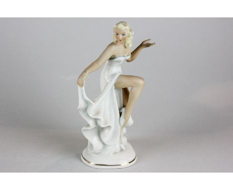 A Goebel porcelain figure of a female dancer, 17cm high