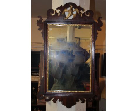 A mahogany Chippendale style mirror with gilt bird decorated fretwork, 43cm by 68cm