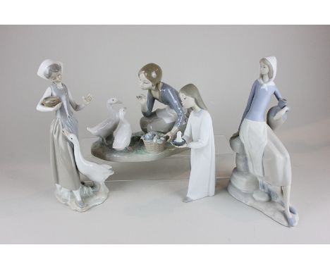 Two Lladro porcelain figures of girls with geese (one a/f), together with two Nao porcelain figures of girls, both in matte g