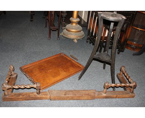 A light oak tea tray, an ebonised jardiniere stand, and adjustable wooden fire fender