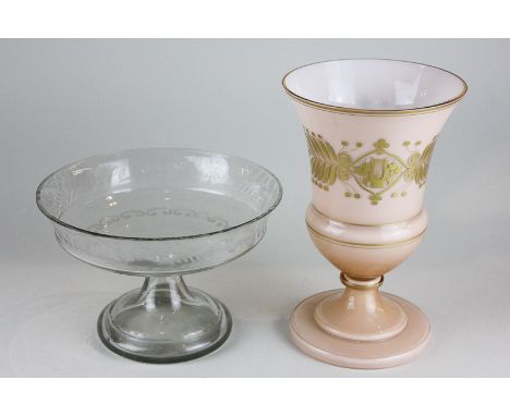 A soft pink Victorian baluster shaped glass vase with gilt decoration depicting a harp surrounded by vine leaves, 23.5cm high