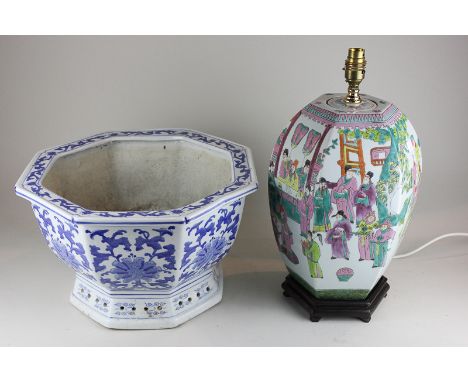 A Chinese pottery octagonal planter with blue floral detail and a large ceramic table lamp, curved hexagonal shape, depicting