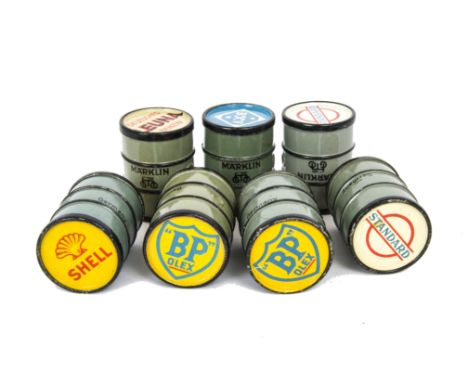 Unboxed Märklin 0 Gauge Oil Barrels (Set 2730G plus), seven large oil drums, comprising Standard (2), BP Olex(2), Shell, BXV 