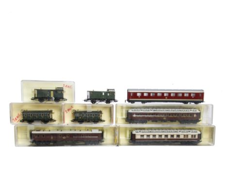 Trix Express OO/H0 Gauge Boxed 3-rail Coaching Stock, including brown Wagons-Lits coaches ref 43392, 43393 and 43394, an unbo