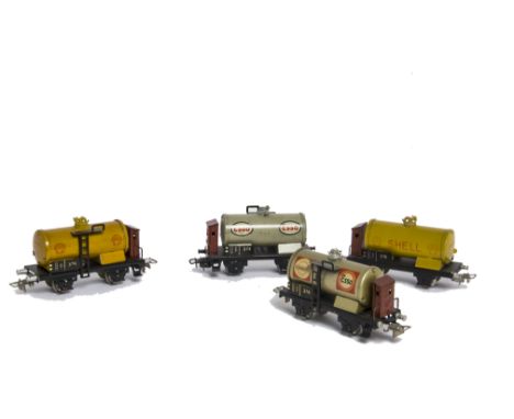 Four Early Märklin H0 Gauge 3-rail ref 374 Tank Wagons, including wartime Standard/Esso wagon (374StK.3) and Shell 374.5, tog
