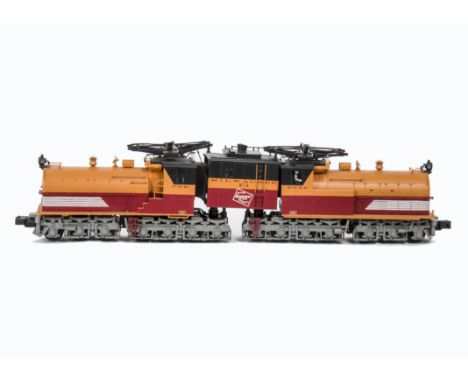 An American 0 Gauge 3-rail Milwaukee RR ‘E-2 Bi-Polar’ Electric Locomotive by MTH, finished in CMSP&P orange, red and black a