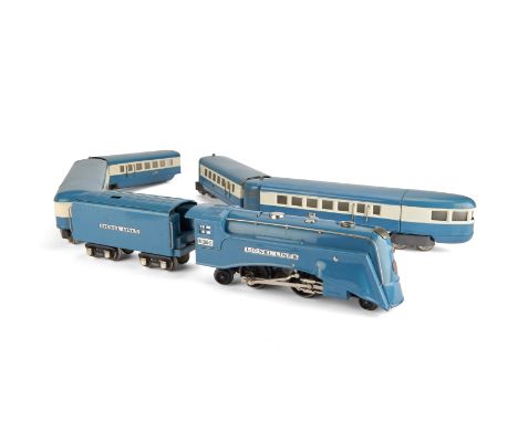 An 0 Gauge 3-rail No 265-E Steam Locomotive and Articulated Train by Lionel, comprising 2-4-2 streamlined locomotive with whi