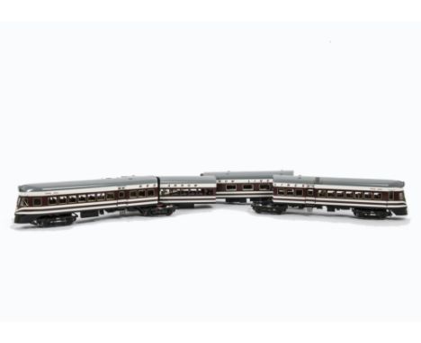 An American 0 Gauge 3-rail Red Arrow Lines ‘Libertyliner’ Articulated 4-Car Set by Sunset Models, four coaches including two 