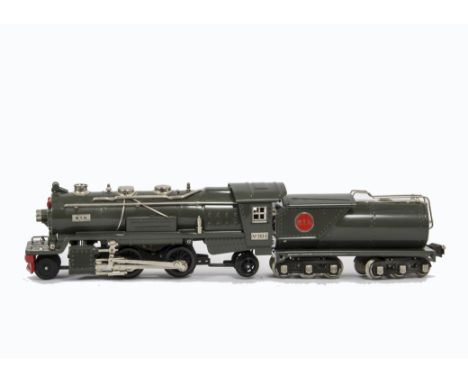 An MTH American 0 Gauge 3-rail Traditional Lionel-style 2-4-2 No 263E Locomotive and Tender, in grey/red with 12-wheel ‘Vande