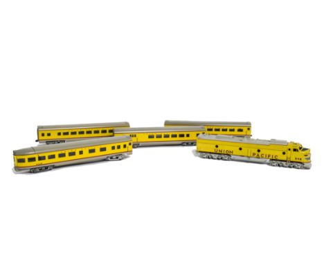 Kit-built H0 Gauge Union Pacific GM Co-Co Diesel Locomotive and Coaching Stock, the loco a powered A unit, in UP light yellow