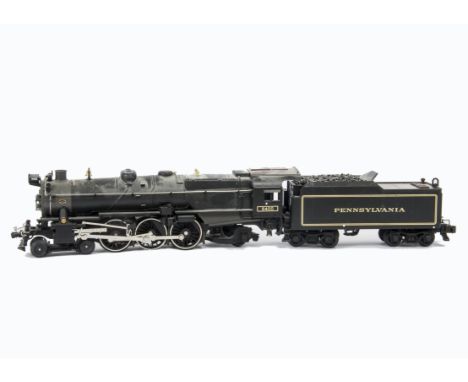 An American 0 Gauge 3-rail Pennsylvania RR ‘Pacific’ Steam Locomotive and Tender by MTH, finished in PRR black as no 5400, wi