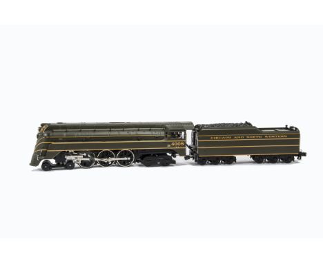 An American 0 Gauge 3-rail C&NW RR Streamlined E-4 Class ‘Hudson’ Steam Locomotive and Tender by MTH, finished in Chicago & N