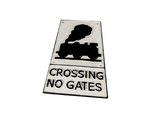 A reproduction cast iron Railway Sign Crossing No Gates, depicting Steam Engine, painted in white with black lettering, VG