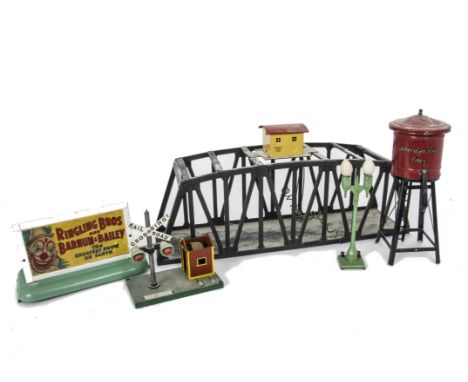 American 0 Gauge Accessories by American Flyer (AC Gilbert), comprising a girder bridge with illuminated lookout cabin, a Bin