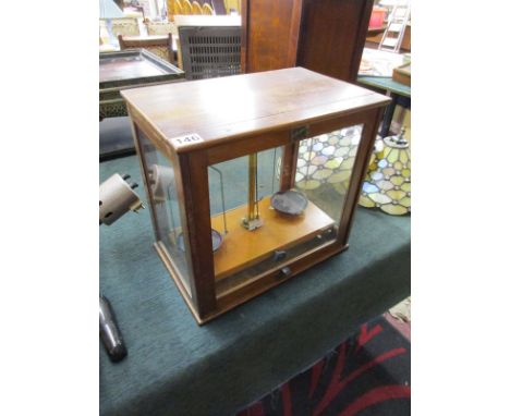 Cased scientific scales