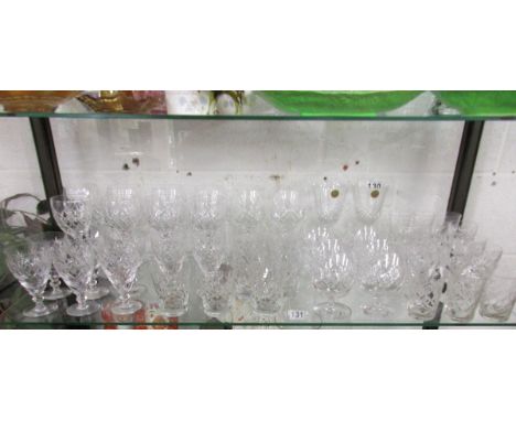 Shelf of cut glass drinking glasses