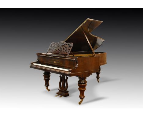 Y†  BLUTHNER, LEIPZIG; AN EARLY GRAND PIANO1854The rosewood case with pierced music rest, on turned and faceted legs and cast