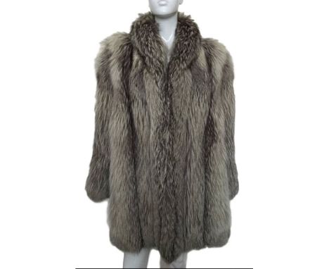 A natural blue fox fur coat labelled "Churchill" 1970s era Measures 21 inches across chest and 39 inches length, taken with c