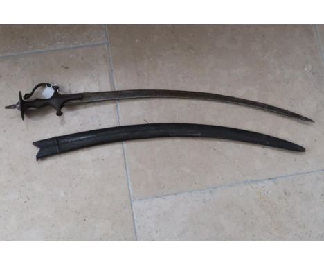 An Indian, late 19th century Talwar with leather scabbard.