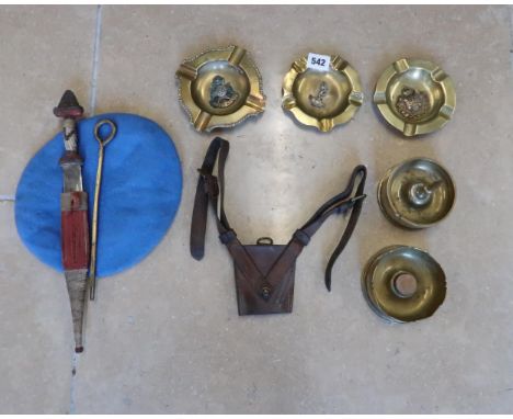 A UN officers beet, sword holder, Webley revolver cleaning rod and African dagger plus three ashtrays and two trench art shel