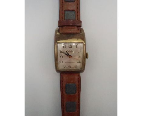 A vintage Trafalgar, manual wind wristwatch, the signed rectangular dial with Arabic numerals and minute track, with later tw