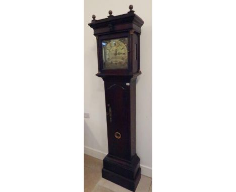 An 18th century 30 hour longcase clock with an 11 inch square brass dial signed Katterns, Thrapston, in an oak case, standing