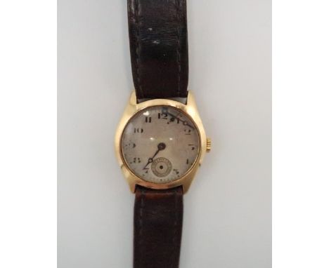 A 9ct gold cased, vintage wristwatch, the circular dial with Arabic numerals, minute track and subsidiary seconds dial, with 