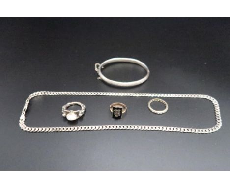 A selection of gold and silver jewellery - A silver ring set with an opal, silver chain and bangle - one 9ct white gold synth