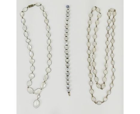 Three piece vintage moonstone and silver tone metal suite including two necklaces and one bracelet. Unsigned. Good condition.