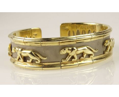 Retro 14 Karat Yellow and White Gold Panther Motif Cuff Bangle Bracelet. Signed PGW 14K. Good Condition. Measures 7 Inches Le