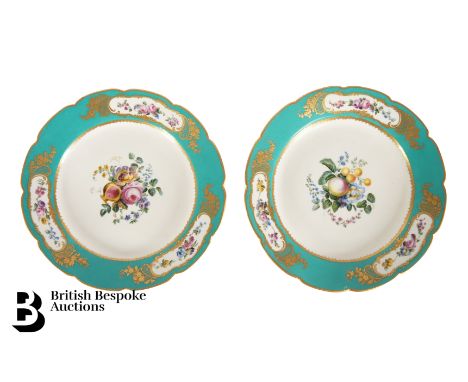 Two French Sevres cabinet plates, circa 1770. The central reserve painted with flowers and fruit, enclosed by a turquoise blu
