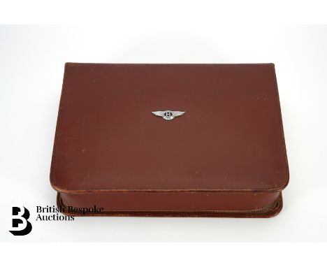 A comprehensive Bentley brown leather travelling grooming case for the Derby Bentley owner including the Bentley 3 1/2 litre,