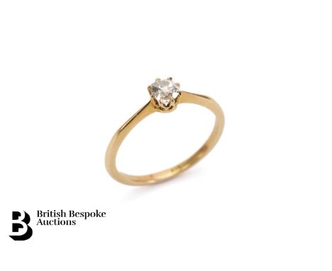 An antique 18ct yellow gold solitaire diamond ring. The old cut diamond approx 35 pts of dias. Size N, weight approx. 2.13 gm